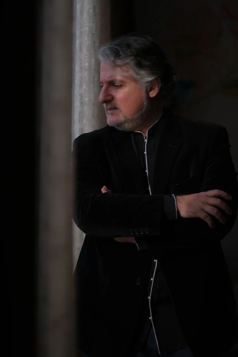 Dr. Savitski at the piano